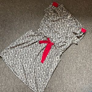 Black and white pattern dress with red accents